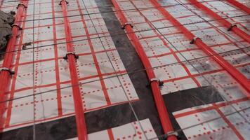 Installing underfloor heating pipes for water heating. Heating systems. Pipes for a heat-insulated floor. 21 video
