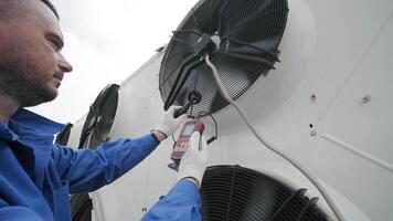 Testing with an anemometer of an axial fan of the condensing unit 14 video