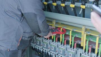 Checking the operating voltage levels of the solar panel switchgear compartment 2 video