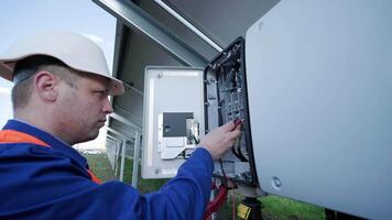 The inspector checks the actual output voltage level of inverter video