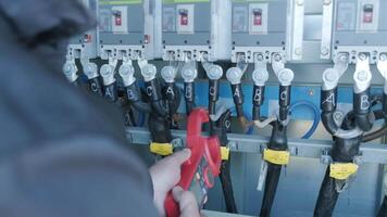 Checking the operating voltage levels of the solar panel switchgear compartment 6 video