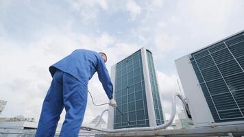 The technician uses a digital camera to check the clogging of the heat exchanger 13 video