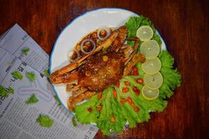 crab with sauce and lettuce on a plate nobleseed photo