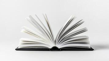 Open Book With Fanned Pages On White Background photo