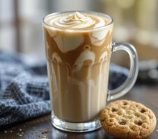 Coffee Drink with Chocolate Chip Cookie on Wooden Table photo