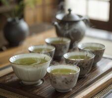 Steaming Green Tea On Wooden Tray photo