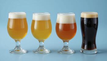 Four Glasses Of Beer On Light Blue Background photo