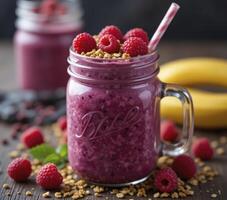 Colorful Berry Smoothie in Jar with Granola photo