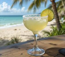 Refreshing Margarita Cocktail on a Tropical Beach photo