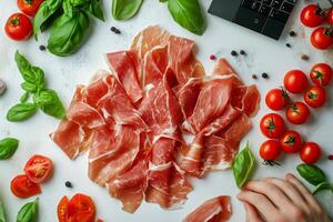 Delicious Cured Ham With Fresh Tomatoes and Basil Arranged on a Countertop Preparing for a Meal photo