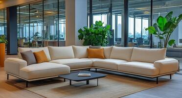 Elegant Modern Office Lounge Area Featuring a Spacious Sectional Sofa and Greenery photo
