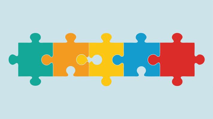 Consistency A series of puzzle pieces coming together with one piece brightly colored and standing out symbolizing the importance of staying true to ones commitments and beliefs..