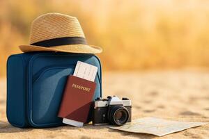 Essentials for a Summer Adventure at the Beach With a Camera, Passport, and Map Ready for Exploration photo