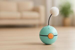 Unique Teal Interactive Toy With White Pom Pom on a Wooden Floor in a Cozy Living Room Setting photo