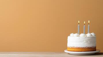 A white cake with three candles on top photo