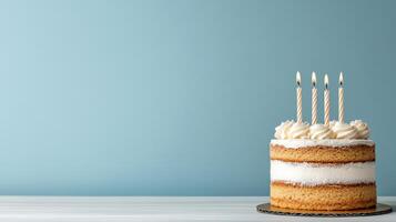 Birthday cake with candles on blue background photo