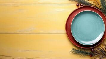 A plate and a bowl on a wooden table photo