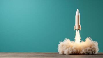 A rocket is taking off from a wooden table photo