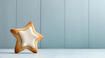A star shaped cookie with frosting on top photo