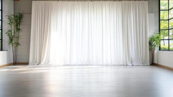 Empty room with white curtains and large windows photo