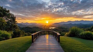 A wooden walkway leads to a beautiful sunset photo