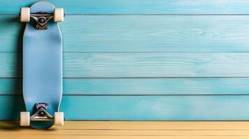 A skateboard is leaning against a wooden wall photo