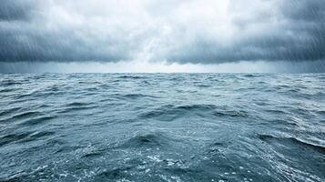 Stormy sea with dark clouds and rain photo