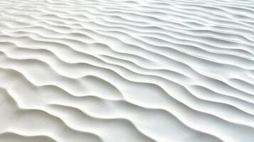 White sand dunes with waves in the background photo
