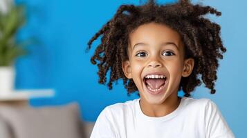 A young child with dreadlocks is smiling photo