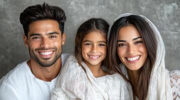 A family with a young girl and a man and woman photo