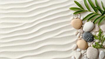 A white sand background with stones and leaves photo