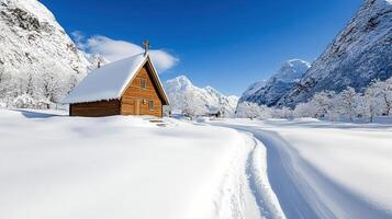 A small wooden cabin in the snow photo