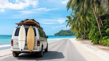 A van with surfboards on the roof photo