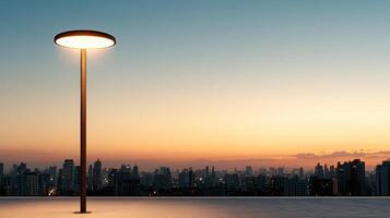 A street lamp on top of a building with a city in the background photo