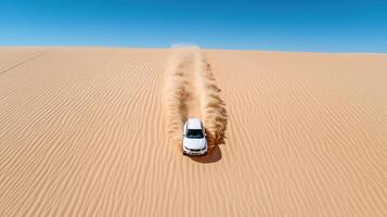 A car driving through the desert on a sunny day photo