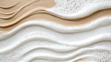 A close up of a white and tan wave photo