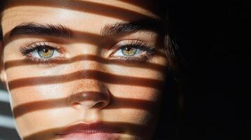 A woman with green eyes and a green background photo