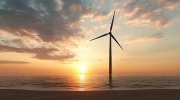 A wind turbine on the beach at sunset photo