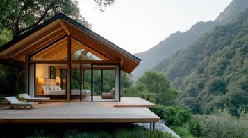 A cabin in the woods with a view of the mountains photo