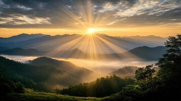 Sunrise over mountains and fog in the valley photo