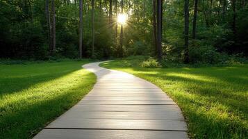 A wooden path in the middle of a green field photo