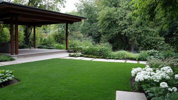 A backyard with a gazebo and lawn area photo
