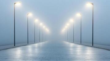 A long empty street with street lights in the fog photo