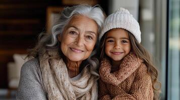 An older woman and a little girl are smiling photo