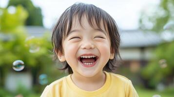 A young child is laughing and smiling photo