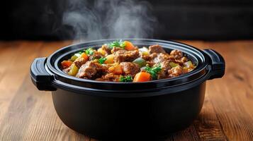 A pot of stew with vegetables and meat in it photo