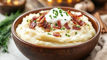 Mashed potatoes with bacon and sour cream photo
