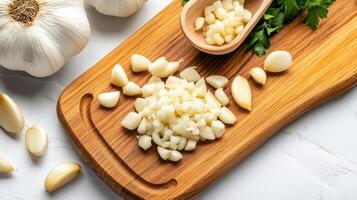 Garlic and garlic cloves on a cutting board photo