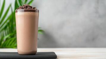 A chocolate milkshake with a chocolate topping photo