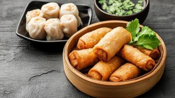 Chinese food in a bamboo container with sauce and chopsticks photo